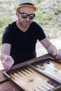 Man Playing Traditional Board Game Backgammon Royalty Free Stock Photo