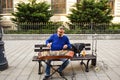 Man playing traditional hammered dulcimer with mallets. Street artist plays songs on the Bucharest`s streets in downtown. Royalty Free Stock Photo