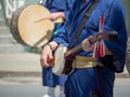 Man playing a Japanese shamisen as part of a parade Royalty Free Stock Photo