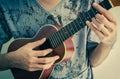 Man is playing Ukelele Royalty Free Stock Photo