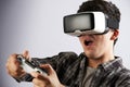 Man Playing Video Game Wearing Virtual Reality Headset Royalty Free Stock Photo