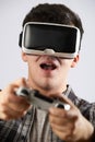 Man Playing Video Game Wearing Virtual Reality Headset Royalty Free Stock Photo