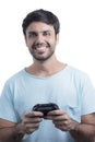 Man playing video game with wireless joystick