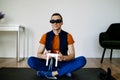 Man Playing Video Games Virtual Reality Glasses In His Apartment. Royalty Free Stock Photo