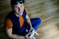 Man Playing Video Games Virtual Reality Glasses In His Apartment. Royalty Free Stock Photo