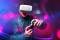 Man playing video games wearing vr goggles Royalty Free Stock Photo