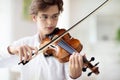 Man playing violin. Classical music instrument Royalty Free Stock Photo