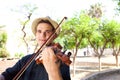 Man playing violin outside Royalty Free Stock Photo