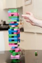 Man playing wood block game at a party