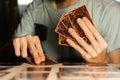 A man playing Yu-Gi-Oh trading card game.