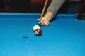 Close up. man plays billiard