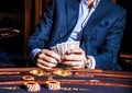 Man plays cards in casino Royalty Free Stock Photo