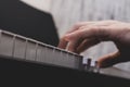 A man playing a keyboard instrument