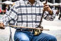 Man plays an erhu