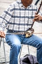 Man plays an erhu