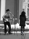 A Man Plays Guitar Shirtless in Russia Royalty Free Stock Photo