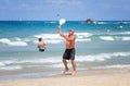 Man plays Matkot in the Mediterranean beach