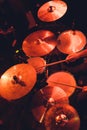 Man plays musical percussion instrument with sticks closeup on a black background, a musical concept with the working drum, Royalty Free Stock Photo