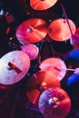 Man plays musical percussion instrument with sticks closeup on a black background, a musical concept with the working drum,