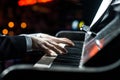 A man plays the piano, close-up of hands. Concert pianist.