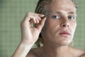Man Plucking Eyebrows Royalty Free Stock Photo