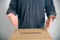 Man Pointing At Ballot Box