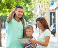 Man pointing the direction for family Royalty Free Stock Photo