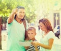 Man pointing the direction for family Royalty Free Stock Photo