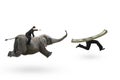 Man with pointing finger riding elephant running after money Royalty Free Stock Photo
