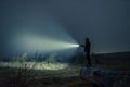 Searching with flashlight in outdoor Royalty Free Stock Photo