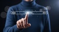Man pointing at loading bar showing transition from year 2026 to 2027 on digital interface Royalty Free Stock Photo
