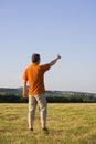 Man pointing with outstretched arm Royalty Free Stock Photo