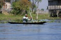 Man in a poled boat Royalty Free Stock Photo
