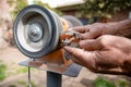 Man polishing Condor Agate stone Royalty Free Stock Photo