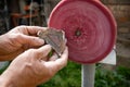 Man polishing Condor Agate stone Royalty Free Stock Photo