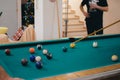 man with pool stick about to serve ball in billiards Royalty Free Stock Photo