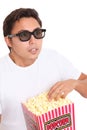 Man with popcorn bucket and 3D glasses Royalty Free Stock Photo