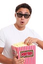 Man with popcorn bucket and 3D glasses Royalty Free Stock Photo