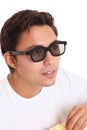 Man with popcorn bucket and 3D glasses Royalty Free Stock Photo