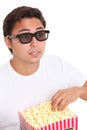 Man with popcorn bucket and 3D glasses Royalty Free Stock Photo