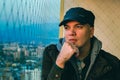 Man portrait at the balcony. Pensive at the balcony Royalty Free Stock Photo