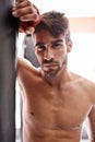 Man, portrait and boxer in gym for fitness, training and determination with gloves for match. Male athlete, mma and Royalty Free Stock Photo