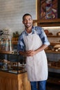 Man, portrait and confident owner in cafe, small business and ready for customer service. Male person, welcome smile and Royalty Free Stock Photo