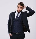 Man, portrait and fashion with smile in studio with confidence, elegant suit and black tie aesthetic. Suave model Royalty Free Stock Photo