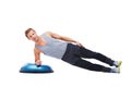 Man portrait, half ball or plank for fitness, studio workout or core strength development. Active balance challenge Royalty Free Stock Photo