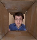 Man portrait inside carton box Royalty Free Stock Photo