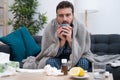 Man portrait suffering cold and flu at home Royalty Free Stock Photo