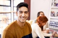 Man, portrait and work break room in a office with cappuccino, smile and happy with coworkers. Staff, worker and relax Royalty Free Stock Photo