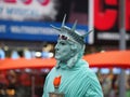 A man posing as the Statue of Liberty near Times Square. Royalty Free Stock Photo