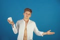 Man posing with cup in open shirt with muscular torso Royalty Free Stock Photo